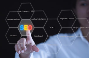 Woman pointing to SEO components which include user experience (UX) design